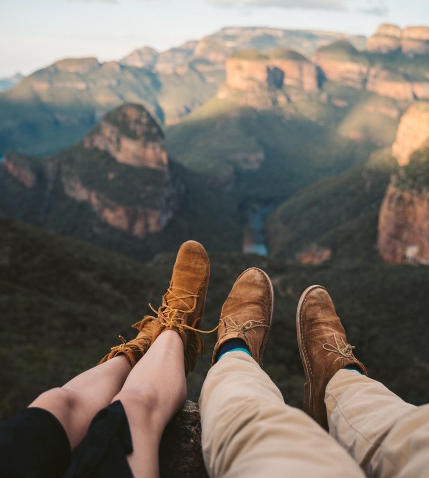 couple wearing brown suade shoes